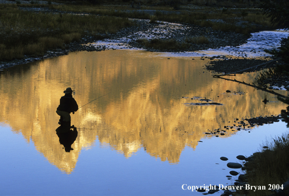 Flyfisherman casting on river.