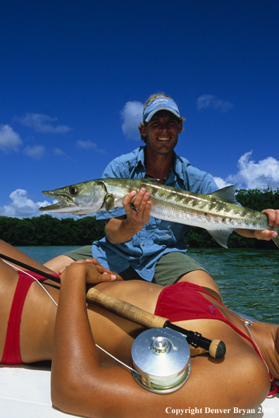 Saltwater fisherman with barracuda