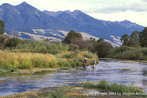 Flyfishermen fishing.