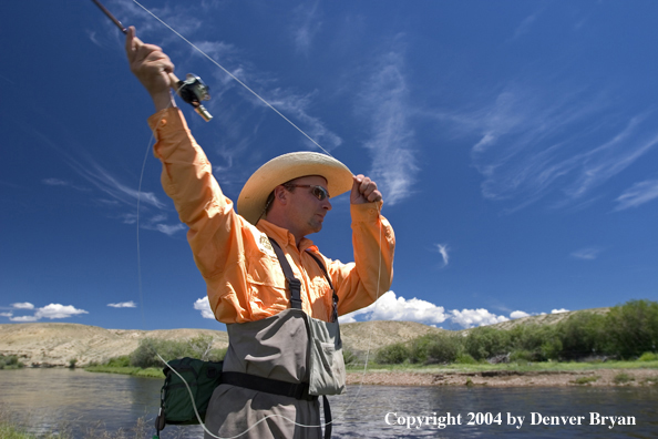 Close-up of flyfisherman casting (MR).