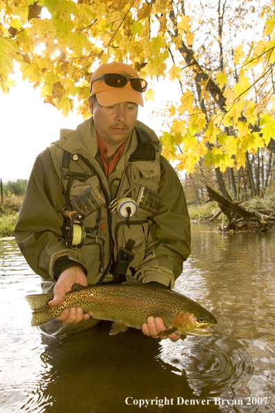 Flyfishermen with nice rainbow trout