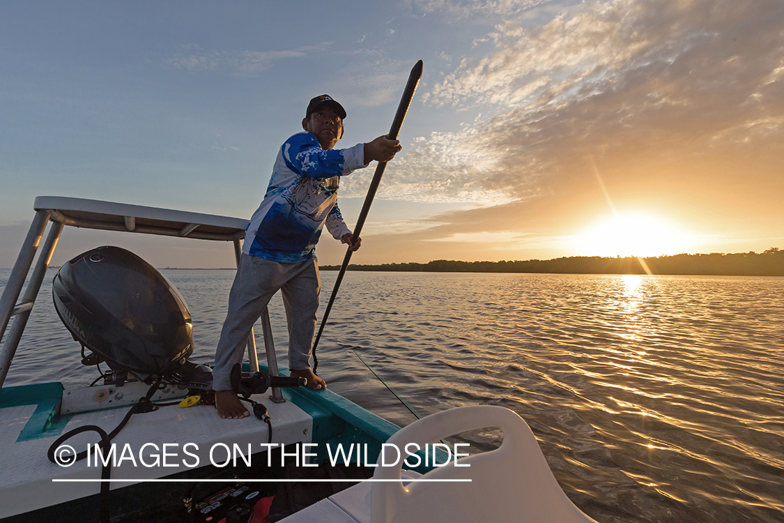 Flyfishing guide on boat.