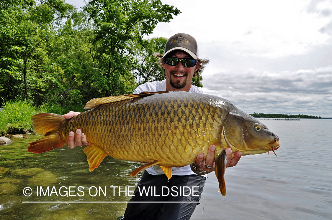 Flyfisherman with carp.