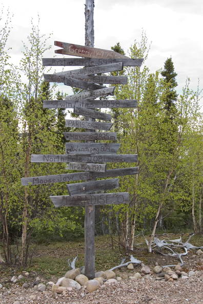 Old wooden signs outside Scott Lake Lodge, Canada