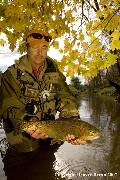 Flyfishermen with nice rainbow trout