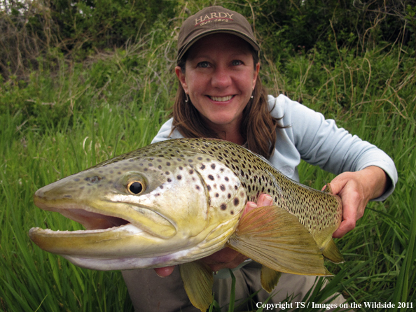 Fisherwoman with Missouri River brown trout. 