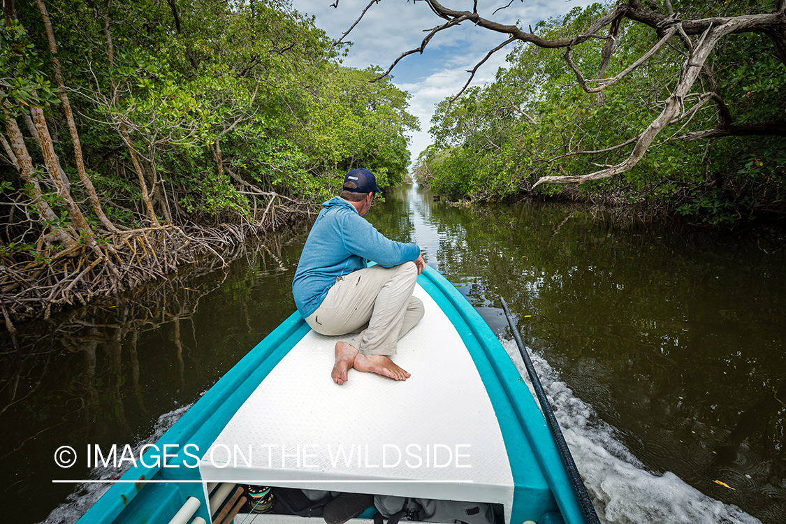 Flyfisherman on boat.