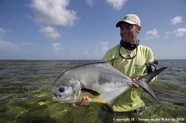 Saltwater Flyfisherman with nice Permit catch