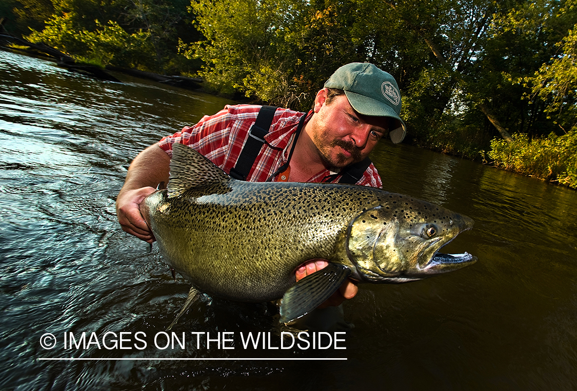 Fisherman with salmon.