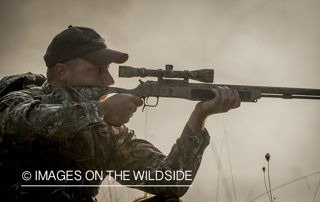 Hunter with muzzleloader.