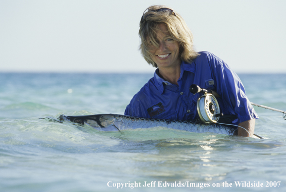 Woman flyfisher with nice tarpon