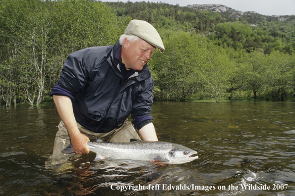 Flyfisherman with a nice Atlantic Salmon