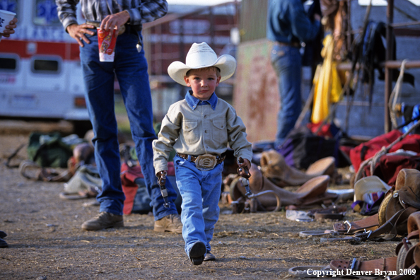 Young cowboy at rodeo