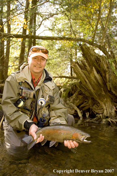 Flyfishermen with nice rainbow trout