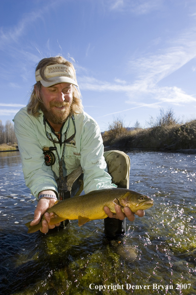 Flyfisherman with Snake River cutthroat trout.