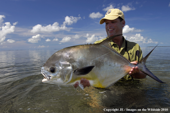 Saltwater Flyfisherman with nice Permit catch