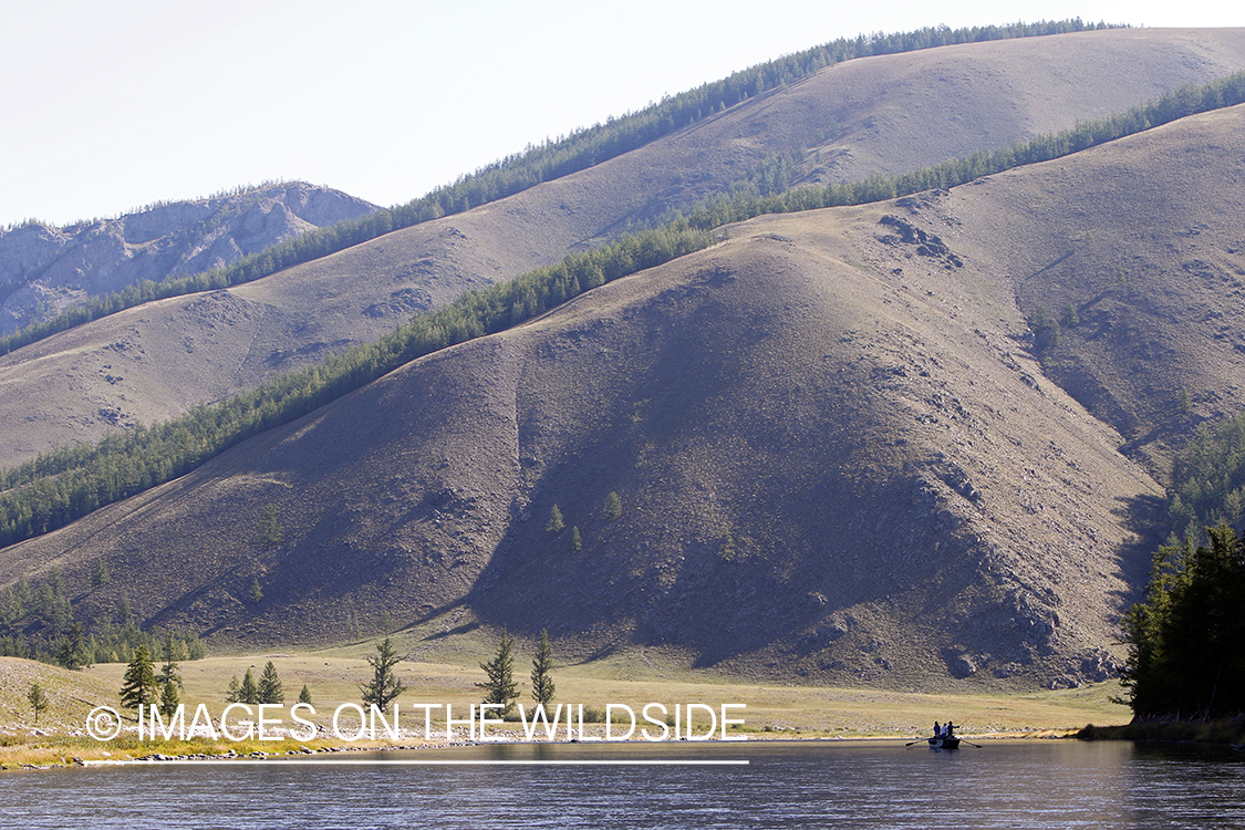 Flyfishermen in float raft on Delger River.