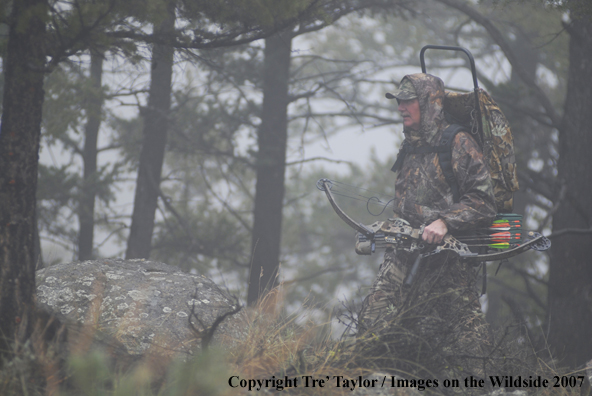 Bowhunter walking