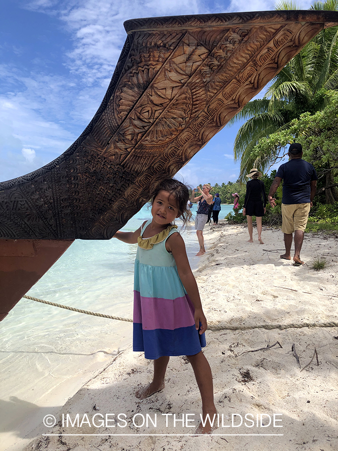 Local girl with boat.