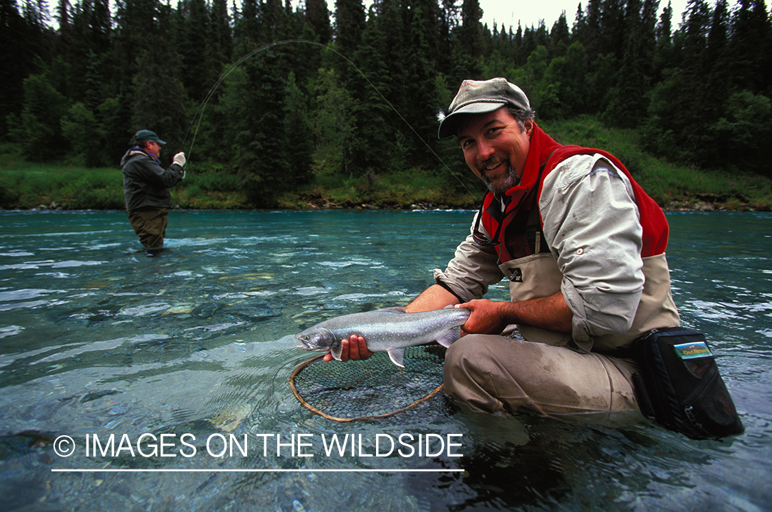 Flyfisherman holding Arctic char.