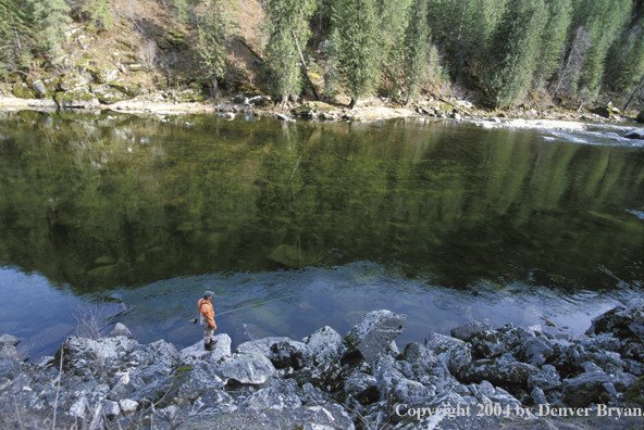 Flyfisherman steelhead fishing.