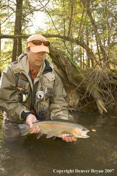 Flyfishermen with nice rainbow trout