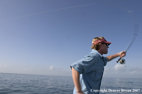 Flyfisherman casting a fly