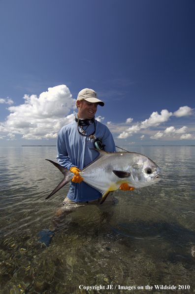 Saltwater Flyfisherman with nice Permit catch