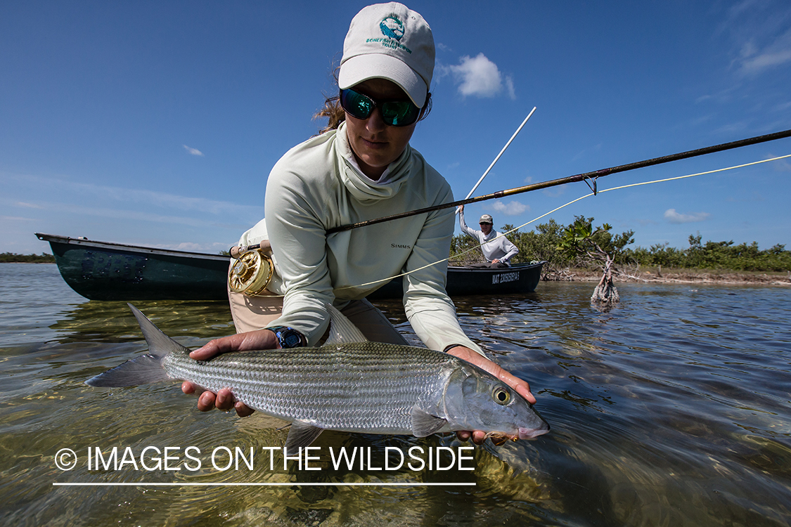 Flyfishing woman with bonefish.