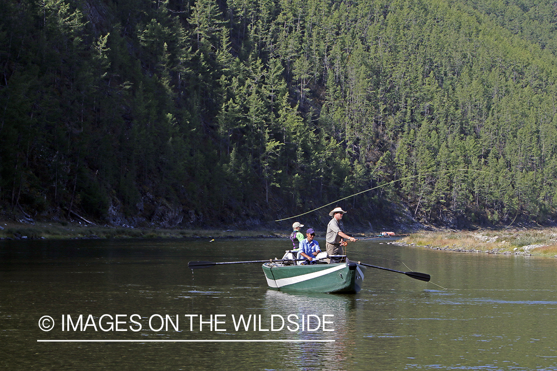 Flyfisherman casting spey/switch rod on Delger River, Mongolia.