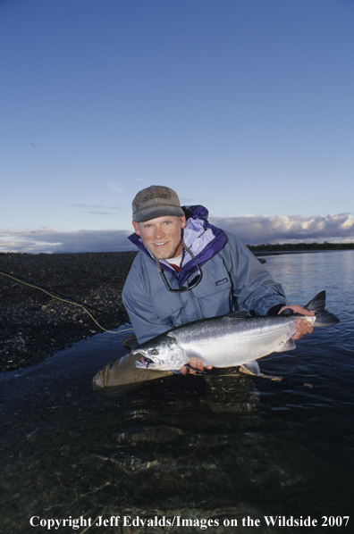 Flyfisherman with nice Silver Salmon