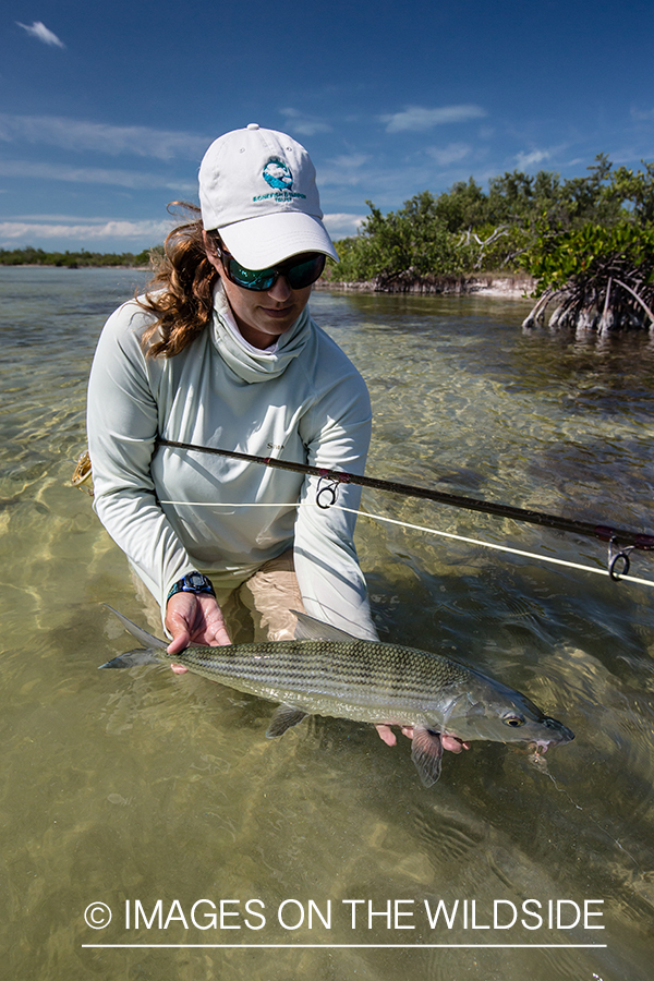 Flyfishing woman with bonefish.