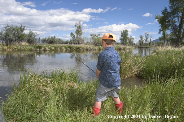 Boy spincast fishing