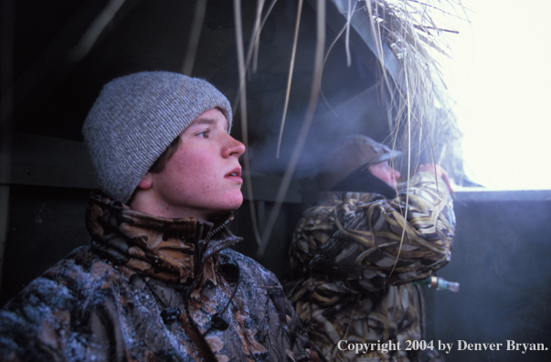 Waterfowl hunters calling for birds.