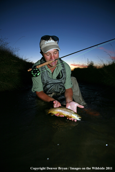 Flyfisherman with Brown Trout