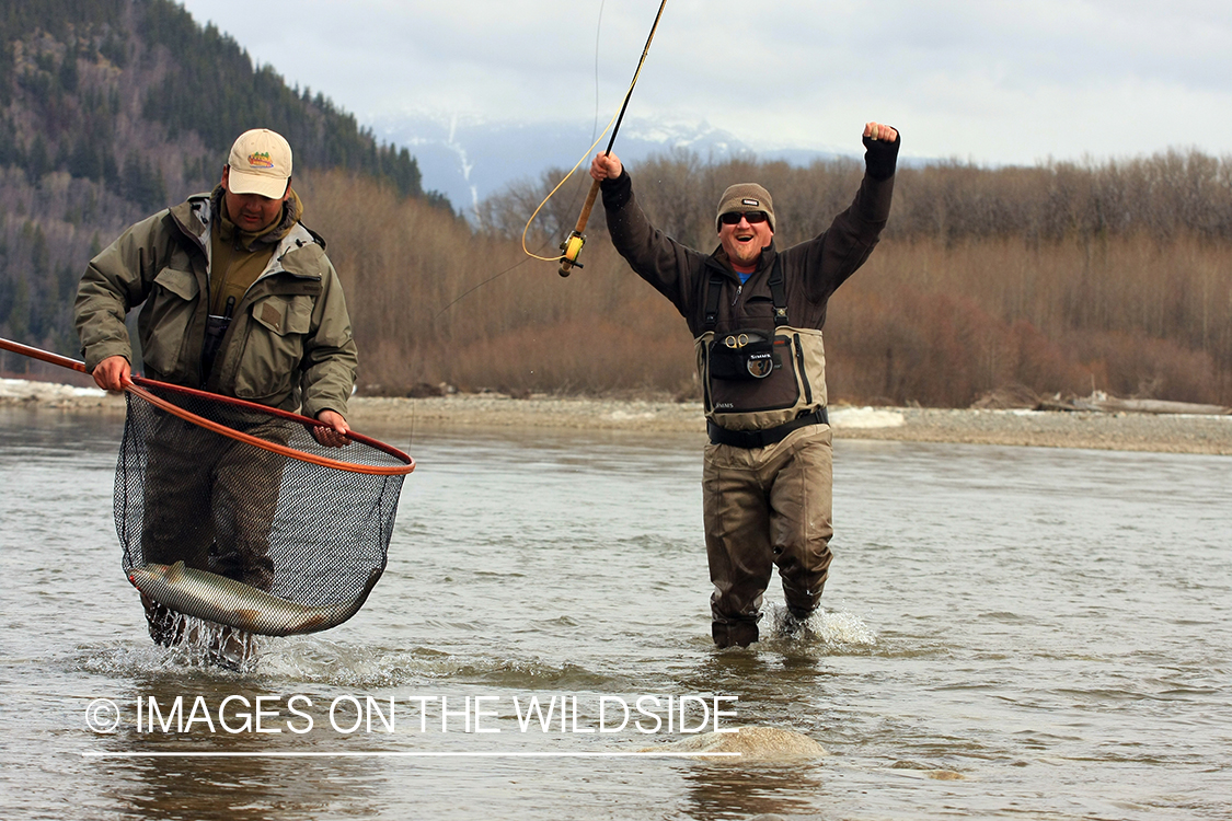 Flyfishermen with bagged Steelhead. 