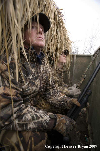 Father and son waterfowl hunting