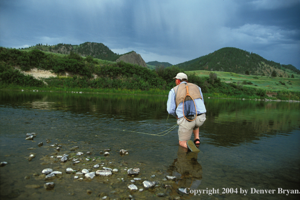 Flyfisherman on river.