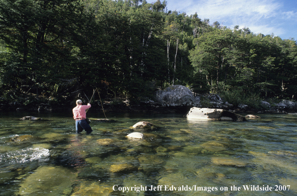 Angler fishing river