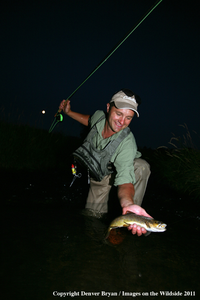 Flyfisherman with Brown Trout