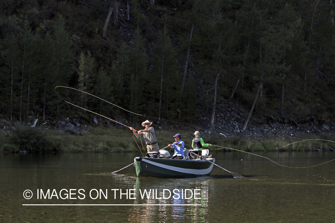 Flyfisherman casting spey/switch rod on Delger River, Mongolia.