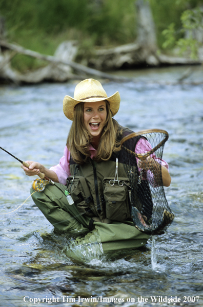 Woman freshwater flyfisher