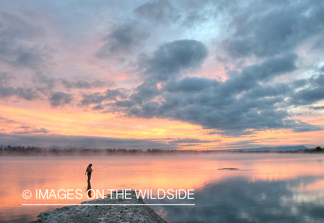 Flyfishing during sunset on Hebgen Lake, MT.