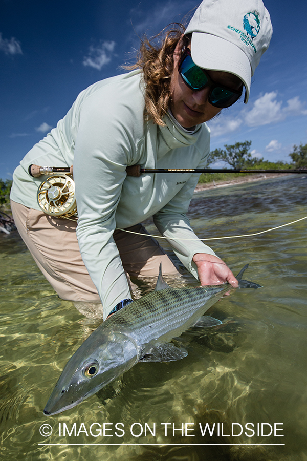 Flyfishing woman with bonefish.