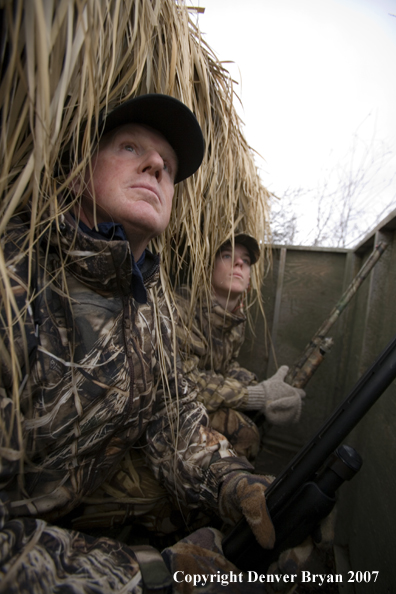 Father and son waterfowl hunting