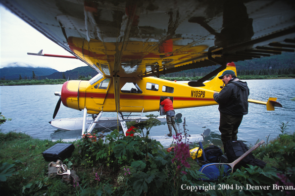 Flyfishermen at float plane.