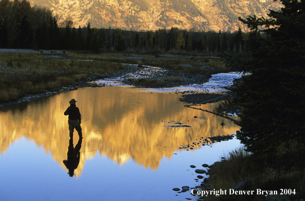 Flyfisherman casting on river.