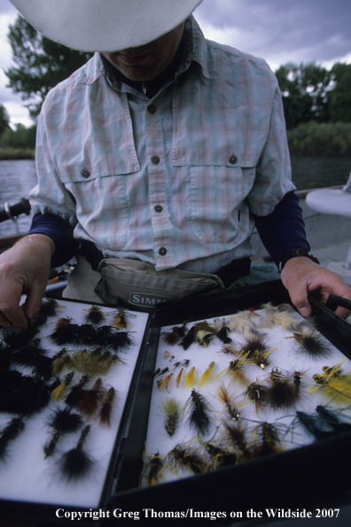 Flyfisherman choosing flies