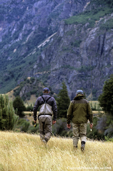 Flyfisherman walking to river