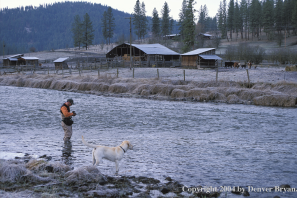 Flyfisherman tying on a fly.